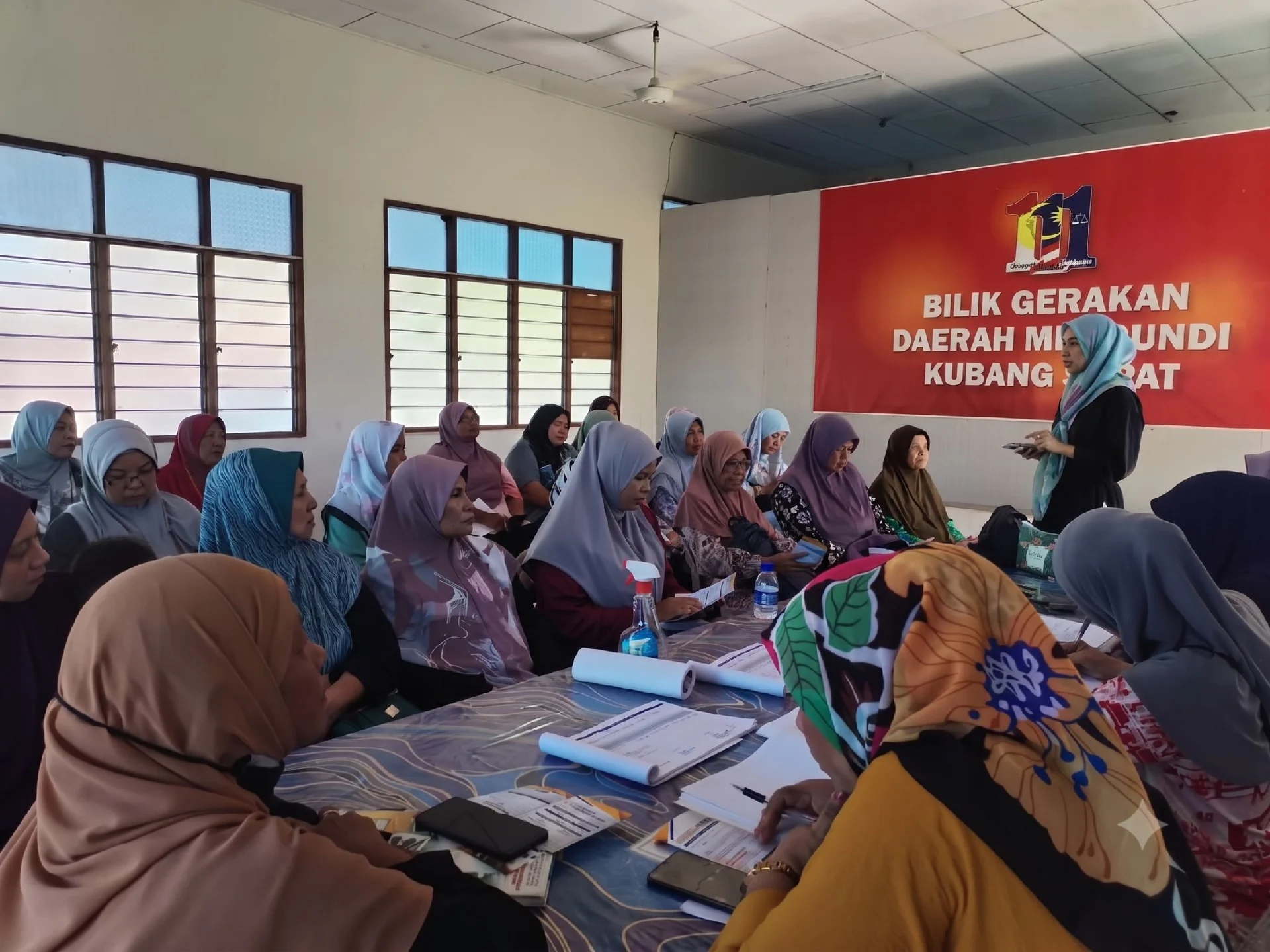 Women entrepreneurs participating in a financial and digital literacy workshop