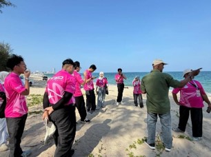 Community group taking part in a coastal activity